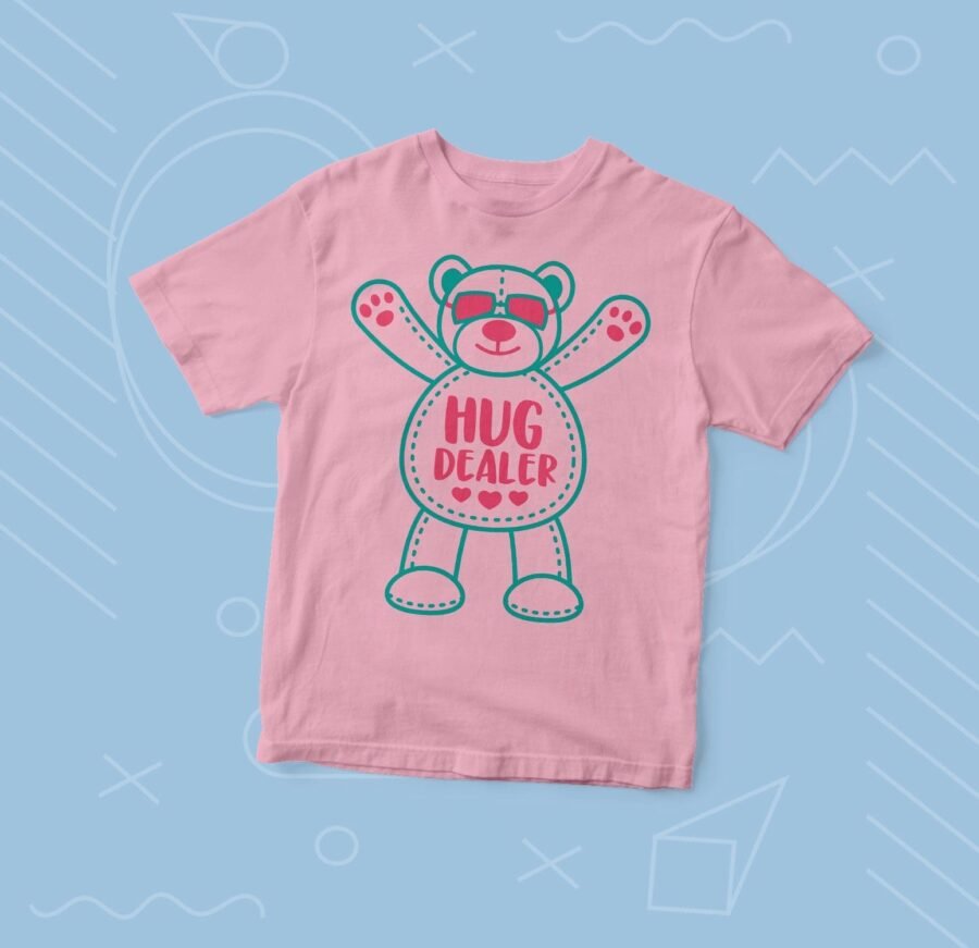 A kids' pink t-shirt with a teddy bear on it and the phrase "HUG DEALER" printed on it:
Product Name: Kids "HUG DEALER" Fine Jersey Tee