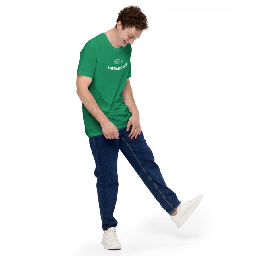 A man wearing a Loading Shenanigans St.Patricks Unisex t-shirt and jeans at St. Patrick's Day parade.