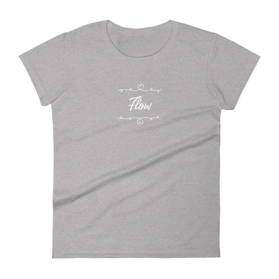 A women's grey Flow With Heart t-shirt displaying the word "flow".