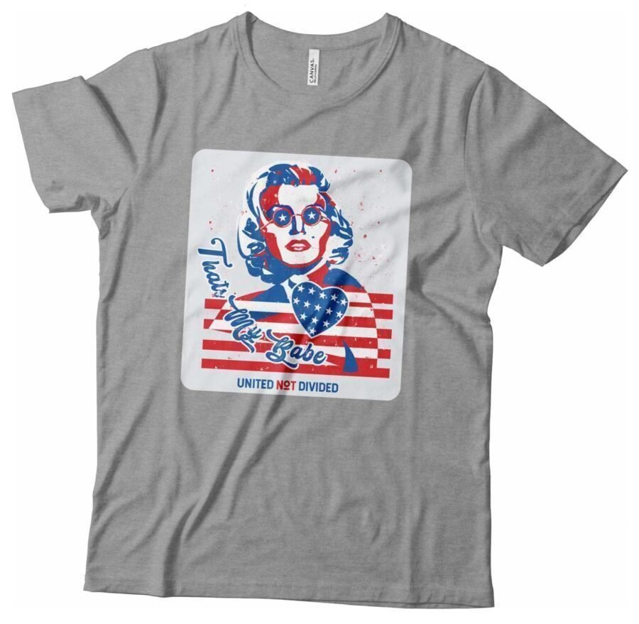 A Independence Day 4th July "THATS MY BABE" Marilyn Monroe Unisex Heavy Cotton Tee featuring an image of Marilyn Monroe wearing an American flag - perfect for Independence Day.