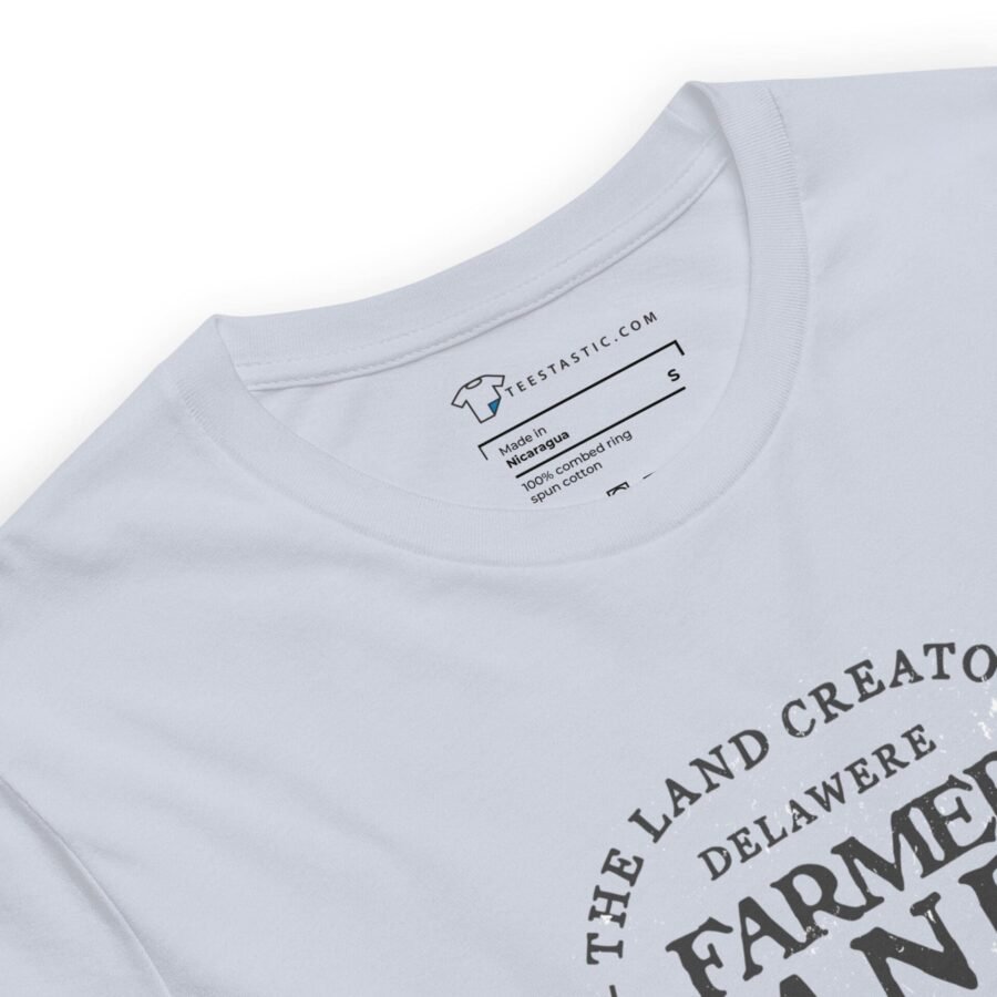 A white unisex t-shirt that says The Land Creators FARMERS HANDS.