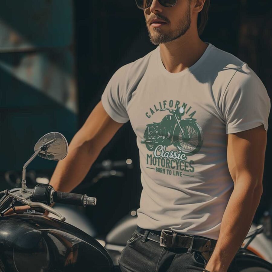 Man in sunglasses leaning on a Classic Motorcycle in California.