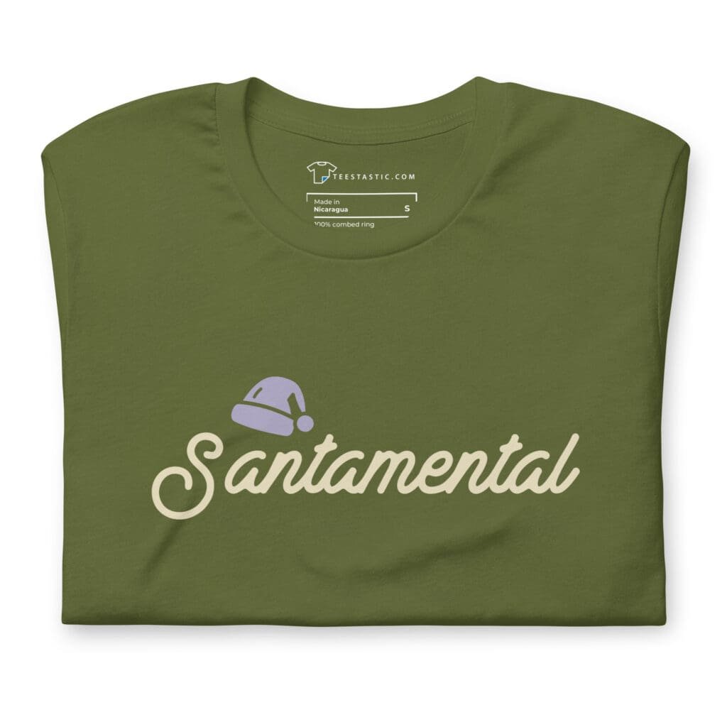 Unisex cotton t-shirt in green, titled "Santa Mental | Festive Holiday," showcases cream-colored script with a holiday flair—a small Santa hat graphic perched on top.