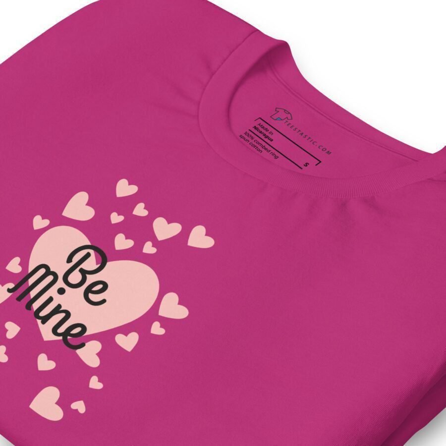 A pink Be Mine unisex t-shirt with the words "be mine" on it.