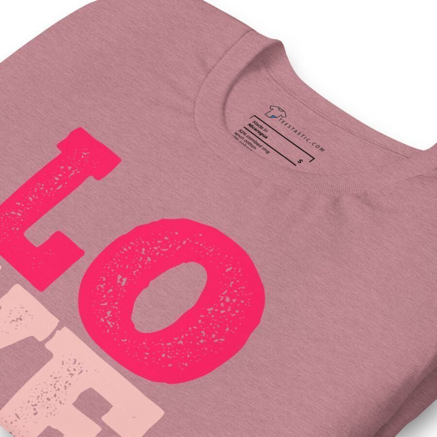 An adorable Love unisex pink t-shirt that features the word "love" prominently.