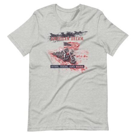 Gray unisex t-shirt featuring a graphic of a motorcycle with an American flag and text that reads "American Dream. Kings, Beer, and BBQ." Red and black design elements highlight the patriotic theme of this Guns, Bikes & MAGA-inspired piece.