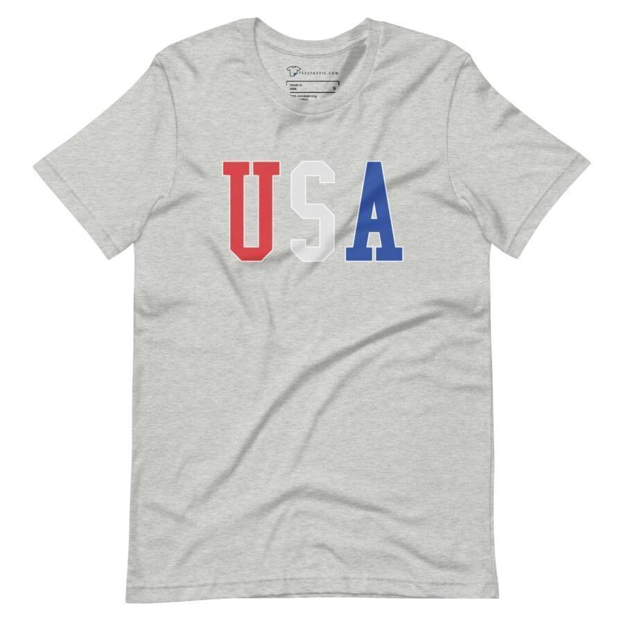 Product Description: The USA | Elections 2024 | Unisex t-shirt is a light gray shirt featuring the letters "USA" prominently on the front. The "U" is in red, the "S" is in white, and the "A" is in blue—ideal for proudly displaying your patriotic spirit as we approach Elections 2024.