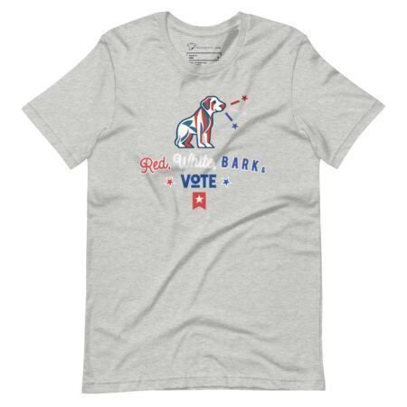 The "Red, White, Bark & Vote | Elections 2024 | Unisex t-shirt" showcases a gray color and features a dog with stars and stripes, along with the text "Red, White, Bark & VOTE" accompanied by a red star—making it perfect for showing your spirit for Elections 2024.