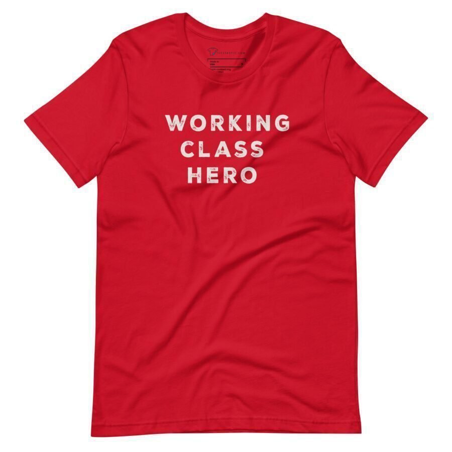 A red unisex t-shirt from the Elections 2024 collection, featuring the text "WORKING CLASS HERO" printed in bold, white capital letters on the front.
