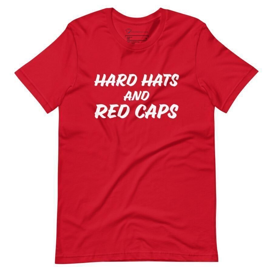 A vibrant unisex t-shirt in red, featuring bold white text that reads "HARD HATS AND RED CAPS" on the front—an ideal choice for showing your support in Elections 2024.