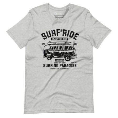 The Surf & Ride | Surfing Paradise | Unisex Heavy Cotton Tee features a vintage surf-themed design showcasing a van, surfboards, and phrases such as "Surf Ride," "Enjoy the Ride," "1957," "Blue Beach," and "Surfing Paradise Registered Trademark." This gray t-shirt perfectly embodies the spirit of Surfing Paradise.