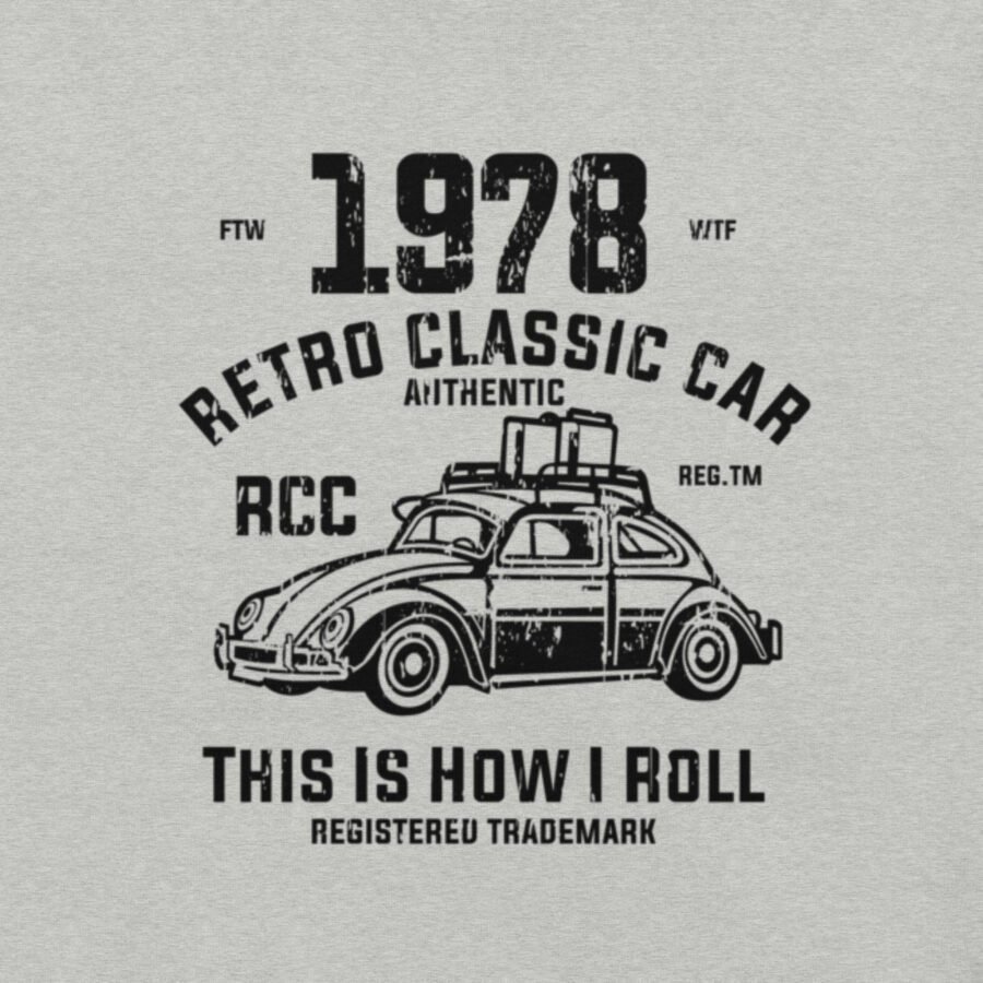 Illustration of a classic car loaded with luggage on its roof, accompanied by text: "Classic Car VW | I Roll." Available on our Unisex Heavy Cotton Tee.