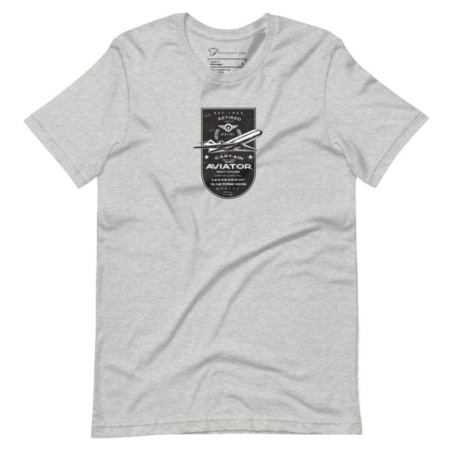 Gray short-sleeve unisex T-shirt featuring a black and white graphic with an airplane and text reading "Retired Aviator" on the front, perfect for any aviation pioneer.