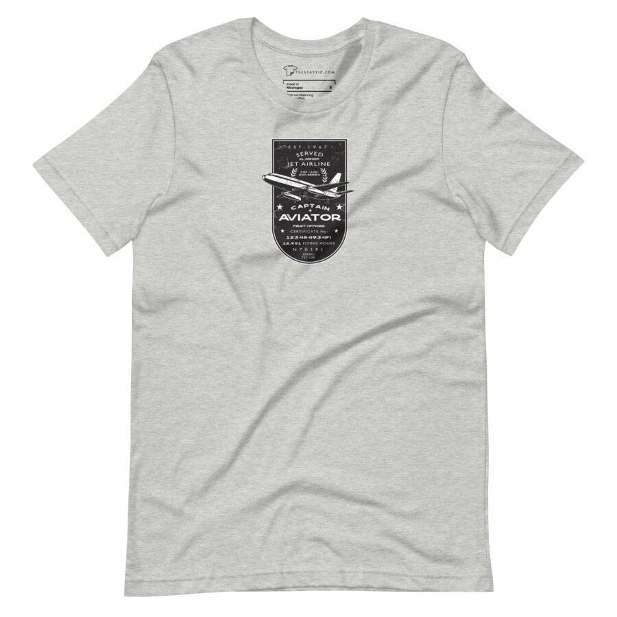 A unisex, light gray T-shirt featuring a black and white design of an Airline Jet 737 with the text "Retired Aviator," celebrating the pioneers of flight.