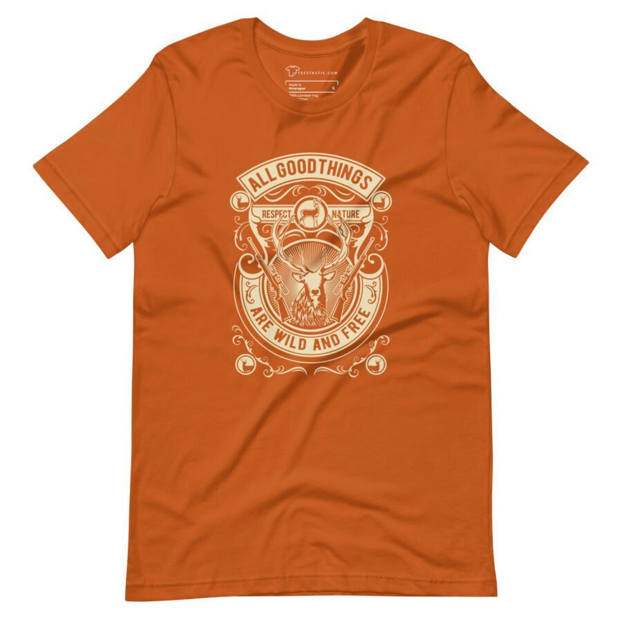 The "All Good Things Are Wild And Free | Unisex Heavy Cotton Tee" in orange showcases an illustration of a ram's head with the phrase "All good things are wild and free," surrounded by intricate designs.