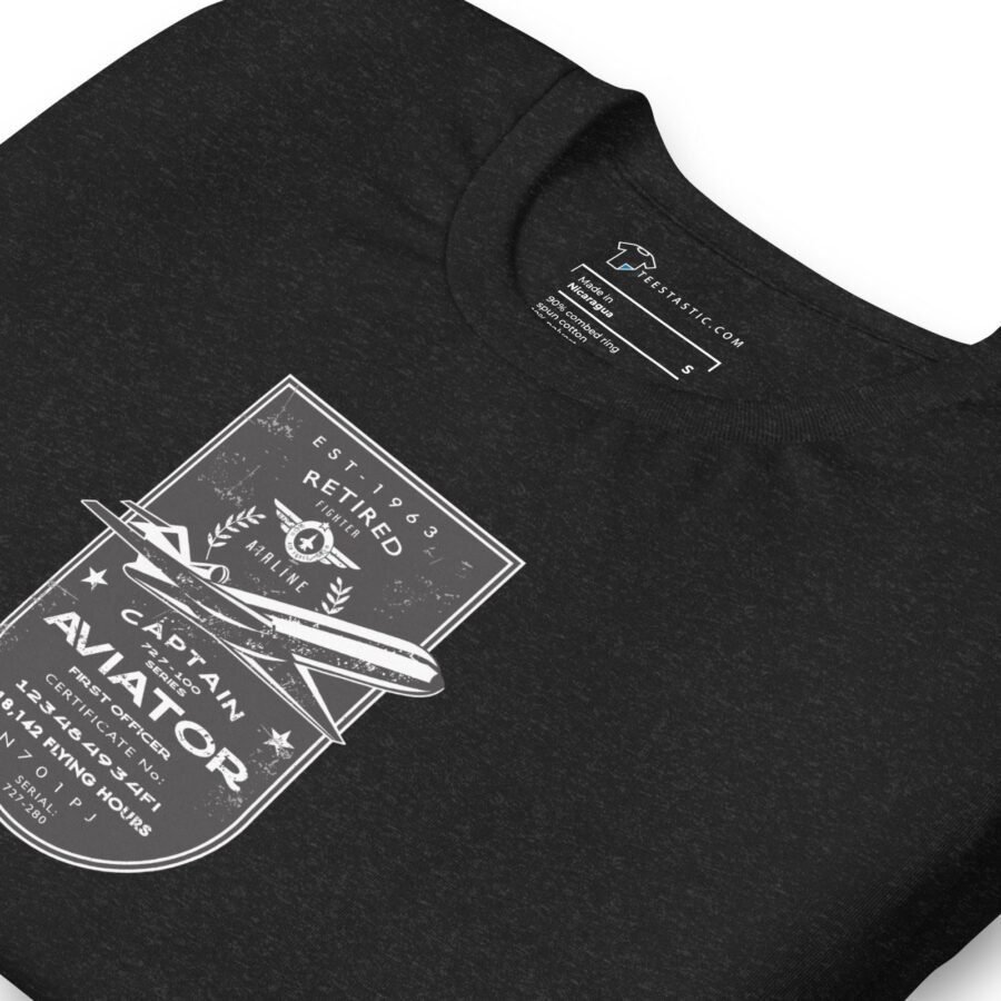 The Pioneer Unisex T-shirt showcases a black design featuring an Airline Jet 727 alongside the text, "Captain Aviator, Retired, Established 1983," and incorporates various aviation-related terms and graphics.