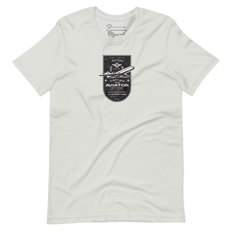 Unisex T-shirt named "Pioneer" featuring a black graphic with the text "Captain Aviator," an airplane, and other aviation-themed designs. Perfect for any retired aviator or aviation enthusiast, showcasing iconic elements like the Airline Jet 727.