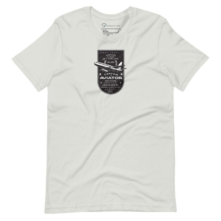 White unisex t-shirt with a black graphic on the front featuring an airplane and the text "Pioneer | Airline Jet 737 | Retired Aviator – Applied & Owned by Airshore." Perfect for any retired aviator or aviation enthusiast.