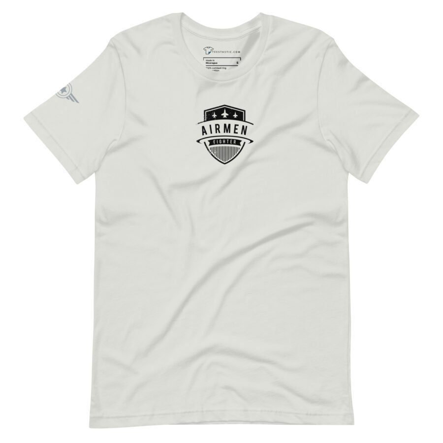 Product Description: "Airmen Fighter" Unisex white T-shirt with a black logo in the center, featuring an intricate stars and shield design. The left sleeve is adorned with a small emblem.