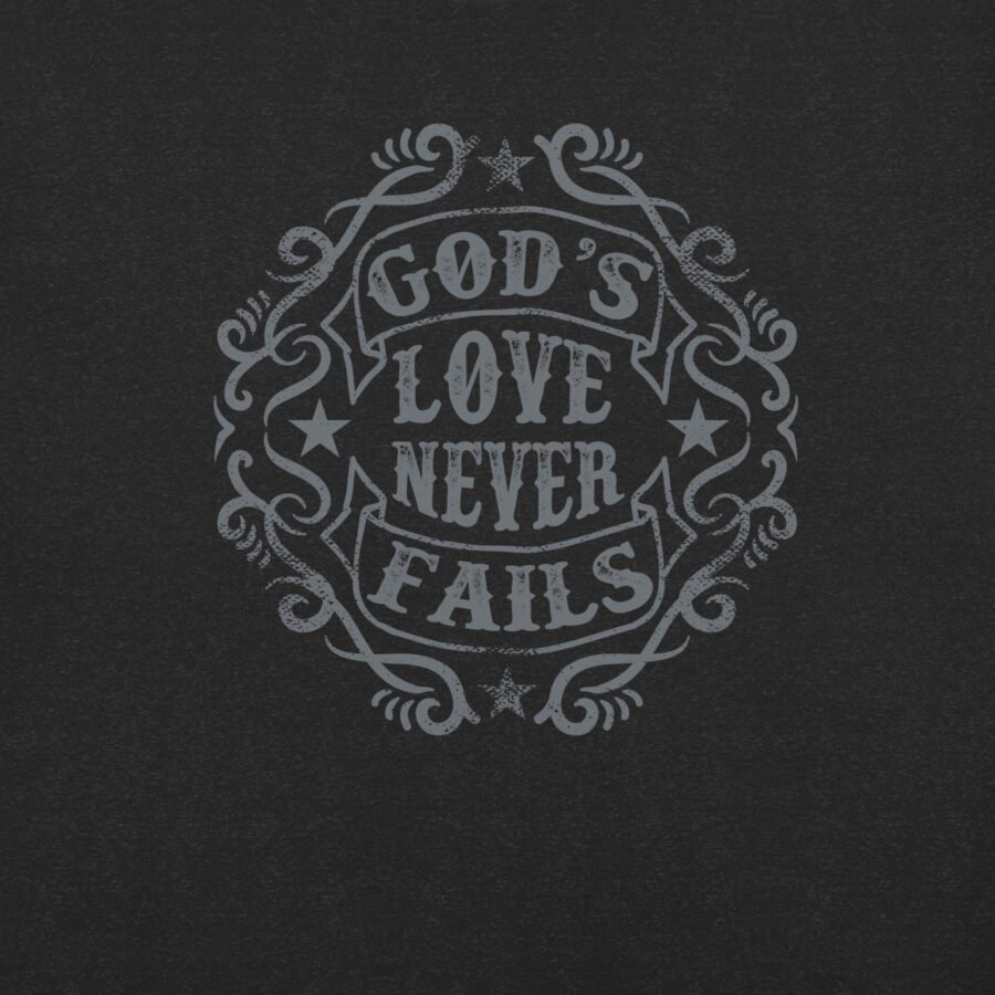 On a dark background, the unisex t-shirt features stylized text that says "God's Love Never Fails," encircled by decorative patterns and stars, beautifully embodying the spirit of faith.